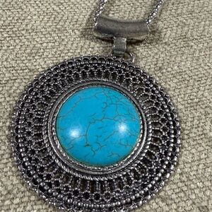 Bohemian Silver and Blue Necklace with Intricate Filigree